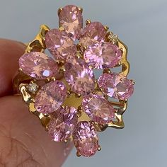 Calling All Pink Lovers ! From My Personal Collection, In Pristine Vintage Condition!Stunning Large Cluster Vintage Pink Ice Cz Ring With 2 Tiny White Genuine Diamonds (Tested).Done In Solid 14k Yellow Gold(Stamped And Tested) . Size 7.75 On Ring Mandrel. The Ring Is Approx.26mm Long By 19mm Wide. Adorned By 2 Clear Diamond Stones, They Are Purely For Decorative Purpose, But Do Add Even More Sparkle To This Already Very Bright And Sparkling Ring! The Ring Weights A Very Solid 7.02 Grams And Super Well , Chunky Made. Absolutely Beautiful, Very Large, Showy ,True Statement Piece Of Jewelry. Pink Diamond Cluster Ring With Accent Stones, Formal Pink Diamond Cluster Ring, Pink Formal Cluster Ring With Prong Setting, Pink Cluster Jewelry With Center Stone, Pink Cluster Diamond Ring With Prong Setting, Pink Diamond Cluster Ring For Anniversary, Cubic Zirconia Cluster Diamond Ring With Gemstone, Yellow Gold Cluster Ring With 17 Jewels, Dazzling Cubic Zirconia Cluster Ring With Gemstone