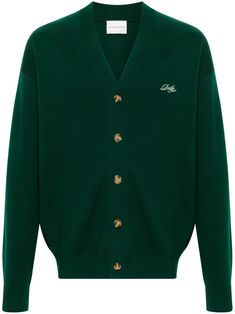 dark green merino wool knitted construction ribbed V-neck embroidered logo at the chest drop shoulder long sleeves ribbed cuffs and hem straight hem front button fastening Classic Green V-neck Long Sleeve Sweater, Green Sweater With Embroidered Logo For Fall, Green Embroidered Logo Sweater For Fall, Green Wool Outerwear With Ribbed Cuffs, Fall Green Sweater With Embroidered Logo, Green Fall Sweater With Embroidered Logo, Classic Green Wool Cardigan, Classic Green Wool Sweater, Classic Green Long Sleeve Cardigan