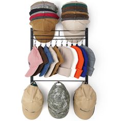 hats and caps are hanging on a rack