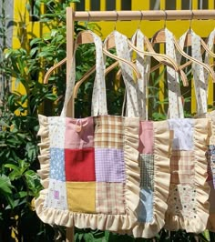 several pieces of fabric hanging from a clothes line