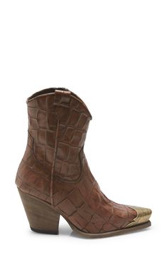 Etched metallic hardware gleams at the toe of a quintessential Western boot that adds a rustic element to your look. 2 3/4" heel (size 38.5) 7" shaft Side zip closure Leather upper, lining and sole Made in Italy Women's Shoes Western Boots Women, Western Boot, Bitter, Western Boots, Wedge Boot, Side Zip, Women's Shoes, Leather Upper, Free People