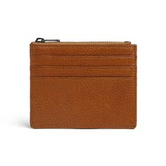 Introducing our RFID Wallet Card Holder, meticulously crafted from full grain Italian vegetable tanned leather. This premium material ensures durability and a luxurious feel, perfect for everyday use. Key Features: Material: Full grain Italian vegetable tanned leather, known for its quality and natural appearance. Size: Compact dimensions of 8.5 x 11 cm, ideal for easy carrying. Color: Cuoio, a rich and classic shade that ages beautifully over time.Structure:4 credit card slots for organized storage.1 top zipper pocket for secure storage of coins or other essentials.RFID blocking function to protect your credit cards and personal information from unauthorized scanning. Enhance your security and style with this RFID wallet card holder, designed for those who prioritize both functionality an Cognac Wallet With Leather Lining For Daily Use, Brown Textured Leather Wallet For Business, Cognac Leather Wallet For Daily Use, Brown Textured Leather Business Wallet, Daily Use Light Brown Leather Wallet, Leather Wallets With Interior Card Slots In Cognac, Cognac Wallet With Rfid Blocking For Everyday, Modern Leather Coin Purse For Business, Modern Leather Wallet For Daily Use