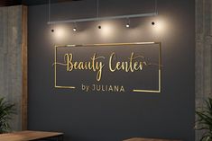 the beauty center by juliana sign is on the wall