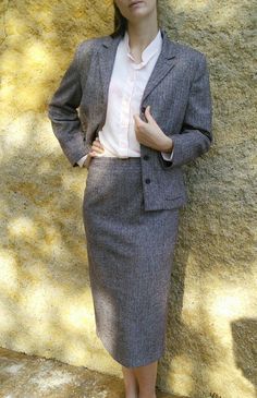 Twill Wool Blend Skirt Suit French Vintage 1990s.  70% Wool 24% polyamide 5% polyester 1% Lycra (percentages will take lining into account), this fabulous heringbone twill power suit screams success. There is a size EU40 waisted skirt with brown lining and split up the back. It is a very flattering cut over the hips.  The blazer is size EU42 so a size larger than the skirt. It is fully lined with brown buttons. The twill is a brown/maroon/cream mix. The blazer has two pockets. The label is Burto Power Suit, Winter Skirt, Vintage Blazer, Wool Skirts, Wool Blazer, Skirt Suit, Vintage Wool, French Vintage, Blazer Suit