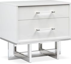 a white nightstand with two drawers on one side and chrome handles on the other end