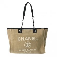 Used Chanel Deauville Chain Tote Beige/Black A67001 Women's Canvas/Leather Bag (Sku: Gzl141qo) === General === Brand : Chanel Model : A67001 === Design === Type : Tote Bag Material : Canvas , Leather Closure : Magnet Gender : Women Handmade : Yes === Size === Size (Hxwxd) : 27cm X 35cm X 18cm / 10.62'' X 13.77'' X 7.08'' Strap Length : 60cm / 23.62'' === Included Items === Accessories : Dust Bag Accessories Notice : Before Purchasing, Please Refer To The Images Of The Accessories Included With T Chanel Deauville, Number 16, Canvas Leather Bag, Chanel Logo, Chanel Model, Handbag Wallet, Chanel Deauville Tote Bag, Wallet Accessories, Canvas Tote Bag