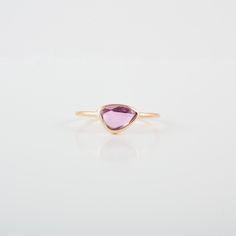 This ring with beautiful Natural sapphire, is set in 18K Solid Gold. It is a ring perfect for any gifting occasions for your loved ones. Purchase the perfect gift for your mom, wife, daughter, girlfriend, and fiancee. -Material - 18K Solid Yellow Gold -Gemstone - Genuine pink Sapphire -Gemstone weight - 2.840 ct -Gross weight - 1.20 grams Pink sapphires are recognized as having a variety of meanings, symbolizing good fortune, power through hardships, intense love and compassion, and subtle elega Stackable Sapphire Birthstone Ring As Gift, Sapphire Stackable Rings Fine Jewelry As Gift, Delicate Sapphire Birthstone Ring For Gift, Delicate Sapphire Birthstone Ring As Gift, Minimalist 14k Gold Amethyst Ring As Gift, Gift Yellow Gold Sapphire Gemstone Ring, Yellow Gold Sapphire Ring Gemstone Gift, Modern 14k Gold Sapphire Birthstone Ring, Modern 14k Gold Sapphire Ring Birthstone