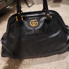 Excellent Condition. There Is A Small Scratches But Almost Brand New Beautiful Vintage Black Leather And Big Size Of Women Handbag. It Was Gucci Luxury Line Bag And It Is Good Bag For You If You Carry A Lots Of Stuff With You. No Refund. No Exchange. Black Shoulder Bag With Horsebit Detail For Travel, Gucci Satchel With Branded Hardware For Evening, Gucci Evening Satchel With Branded Hardware, Black Satchel With Horsebit Detail, Black Satchel Bag With Horsebit Detail, Black Horsebit Detail Satchel Bag, Gucci Black Satchel With Gold-tone Hardware, Black Gucci Satchel With Gold-tone Hardware, Gucci Black Bag With Gold-tone Hardware