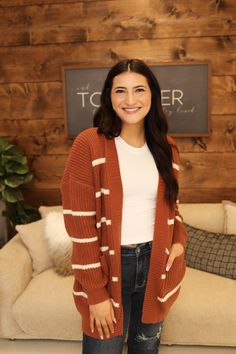 This Feelin' Fall Striped Cardigan is so cozy! Perfect for brisk days, the burnt orange knit keeps you cozy with handy pockets. Add some fashion flavor with its chic stripes and you'll be ready for anything autumn throws at you! Fall Stripes, Orange Knit, Cocoon Cardigan, Be Ready, Striped Cardigan, Cozy Fall, Burnt Orange, Cardigans For Women, Stripes