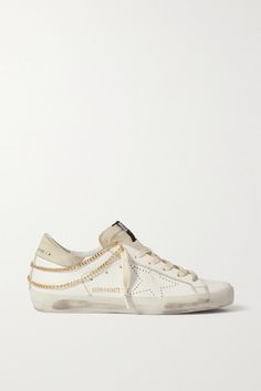 EXCLUSIVE TO NET-A-PORTER. This version of Golden Goose 'Superstar' sneakers is embellished with layered gold chains along the ankles. They're made from white leather that's been brushed and waxed by hand for a distressed, lived-in look and have suede tongues and heel caps. Wear yours with everything from tailoring to denim. -- Rubber sole measures approximately 10mm/ 0.5 inches - White leather, light-gray suede (Cow) - Lace-up front - Made in Italy Nashville Travel, Outfit Wishlist, Preppy Shoes, Golden Goose Sneakers, Golden Goose Shoes, Shoe Inspo, Golden Goose Deluxe Brand, Heel Caps, Swag Shoes