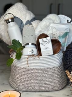 Deluxe selfcare relaxation gift tote is the perfect way to send a hug. Our super cozy barefoot dreams dupe throw blanket , Lemo'n Faux fur slippers, stainless steel and bamboo water bottle, luxury brand Capri blue 8 oz candle , lavender bud sachet, wooden aracia wood heart bowl, Terre A Terre oatmeal French bath bar and bath salts.  Delivered wrapped in cellophane and ribbon. Relaxation Gift Basket, Bamboo Water Bottle, Send A Hug, Spa Basket, Gifts Baskets, Heart Bowl, Spa Gift Basket, Realtor Closing Gifts, Gift Totes