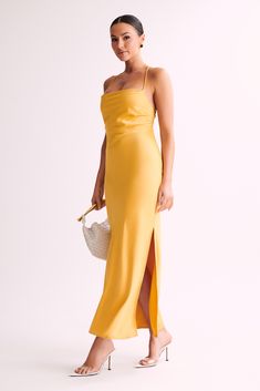 An understated and elegant silhouette for the modern muse. The much-loved SYDNEY Straight Neck Slip Maxi Dress returns in a fresh hue for a season of celebrations. Boasting a squared neckline and head-turning open back, this midi features a cross back design with a self-tie feature for a customised fit. Team with barely-there heels to keep Sydney in the spotlight. This style is designed to be a relaxed fit. It can be easily adjusted using the back lace-up detail. FEATURES: Squared neckline Skinn Fitted Midi Dress With Straight Neckline For Prom, Fitted Midi Dress With Tie Back And Straight Neckline, Square Neck Maxi Dress For Date Night, Chic Square Neck Dress With Tie Back, Party Midi Dress With Straight Neckline And Tie Back, Date Night Maxi Dress With Square Neck, Summer Gala Dress With Ruched Back, Chic Square Neck Backless Dress With Tie Back, Summer Square-neck Backless Dress For Party