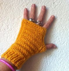 Handmade mustard mustard yellow mittens, knitted seamlessly My mid-season mittens Fine wool to have warm hands, At the gaudron point for style. The mittens, it's convenient, it warms the hands and it allows you to use your 10 fingers ... Measures: 15 cms in length 23 cm hand width 19 cm wrist circumference All very stretchy! Choice of colors possible. Choice of possible size. Contact. Washing in a machine at 30 degrees Dry laundry not recommended Personal creation Careful sending under bubble wr Handmade Yellow Knitting Pattern For Winter, Winter Yellow Knitting Pattern, Handmade Winter Knitting Pattern In Yellow, Mitten Gloves, Mustard Yellow, Fingerless Gloves, Arm Warmers, Mustard, Gloves