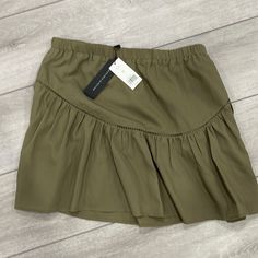 Banana Republic Olive Green Skirt Xs Army Green Mini Skirt, Olive Green Mini Skirt, Nude Skirt, Black Ruffle Skirt, Olive Green Skirt, Utility Skirt, Tweed Pencil Skirt, Banana Republic Skirt, Printed Pleated Skirt