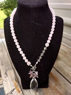 Elegant rose quartz necklace with glass bead accents and glass pendant. Could be dressed up or down. Approximately 18 inches in length. Elegant Pink Glass Beaded Necklace, Elegant Pink Glass Beaded Necklaces, Ravenclaw Scarf, Rose Quartz Necklace, Quartz Necklace, Bronze Color, Glass Pendant, Glass Bead, Glass Pendants