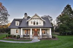 a house that is sitting in the grass