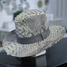 Handmade Genuine King Dragon Python Leather Snakeskin Fedora Wide Brimmed Hat Materials: Snakeskin, Python Leather See Details Snakeskin Hat For Stylish People. Unique Design, Premium Quality, Luxury Style Outside: Genuine Dragon Python Leather All Our Products Are 100% Handmade, We Always Try To Create Interesting Ideas To Make Your Style Unique. We Use Only The Highest Quality Materials And Accessories From Around The World And Only Best Leather From Indonesia. Before Listing Each New Model Un Elegant Leather Fedora, Elegant Leather Hat With Short Brim, Elegant Leather Fedora Hat, Elegant Short Brim Leather Hat, Elegant Leather Fedora Hat Bands, Elegant Wide Brim Leather Fedora, Elegant Leather Fedora For Formal Occasions, Luxury Wide Brim Fedora For Kentucky Derby, Elegant Leather Wide Brim Hat