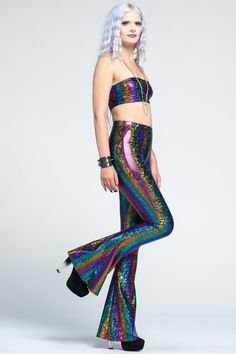 "Funky sparkly holographic rainbow bell bottom leggings with high waist. These fun, futuristic, psychedelic flares are super stretchy! The perfect flared pants for any dark, Burning Man, disco, festival, streetwear, flow, dance wear, mermaid, EDM, 70s, rave, robot, rocker or boho wardrobe! You can find the size chart in the last photo of the listing. If you want a custom inseam, please choose the SIZE WITH CUSTOM INSEAM option in the drop down box, and specify your custom finished inseam in the Bell Bottoms Leggings, Flow Dance, Groovy Chick, Festival Streetwear, Boho Wardrobe, Harry Outfits, Bell Bottom Leggings, Halloween Rave, 70's Disco