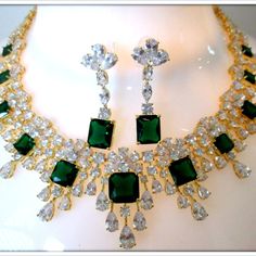 Simply Stunning Emerald Necklace And Earring Jewelry Set Features Beautiful Details With Clear Cz Stones This Is The Perfect Set For The Bride Who Wants To Incorporate White Diamond .Made Using Zircon Stones, Which Is Well Known As A Substitute For Diamond Due To Its High Hardness And Great Fire. Maintenance Instructions: Remove Jewelry Before Bathing , Swimming Or Sleeping. Please Clear Your Jewelry With Fresh Water After Wearing And Dry It Immediately And Ensure That It Stores In A Dry Box Thank You Green Cubic Zirconia Jewelry For Evening, Evening Green Cubic Zirconia Jewelry, Luxury Jewelry Sets With Cubic Zirconia And Matching Earrings, Luxury Cubic Zirconia Jewelry Set With Matching Earrings, Luxury Emerald Bridal Necklace Gift, Formal Crystal Plated Jewelry, Luxury Cubic Zirconia Jewelry Sets, Luxury Jewelry Sets With Sparkling Stones For Gifts, Evening Green Jewelry With Diamond Accents