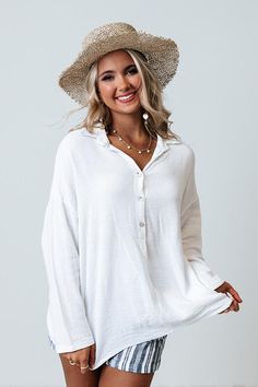 Keep it casual in our timeless white 'Give Me A Break Shift Tunic' featuring soft lightweight material, a button up bodice with a collared v-cut neckline, long loose sleeves, and a relaxed silhouette that falls into a rounded hemline! Give Me A Break, Loose Sleeves, V Cut, V Cuts, Bodice, Give It To Me, Button Up, Sleeve Length, White