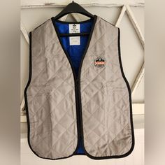 Size Medium. See Pictures For Measurements. Brand New. This Ergodyne Chill-Its 6665 Evaporative Vest In Size M Is A Must-Have For Anyone Working In Industrial Or Facility Maintenance Settings. The Vest Is Designed To Provide Maximum Protection Against Workplace Hazards While Keeping The Wearer Cool And Comfortable. Made In China, This Vest Is Of The Highest Quality And Is Built To Last. The Gray Color Of The Vest Is Perfect For Blending In With Any Work Outfit, And The Ergodyne Brand Name Ensure Evaporative Cooling, Work Gear, Vest Designs, The Gray, Stay Safe, Blue Gray, Blending, Work Outfit, Blue Grey