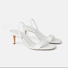 Genuine Zara New With Tag, Euro Size 39 Material: Leather Upper Color(S): White Heel Height About 3 Inches Love Elastic Heel Straps.. So Elegant And Simple Chic White Slingback Sandals With Padded Heel, Elegant White Slingback Sandals With Round Toe, White Slingback Sandals With Wrapped Heel, Leather Slingback Sandals For Summer Wedding, Chic White Slingback Sandals With Wrapped Heel, White Leather Slingback Sandals For Party, Chic Zara Slingback Sandals For Summer, Zara Formal Slingback Sandals For Summer, Zara Slingback Sandals For Summer Formal