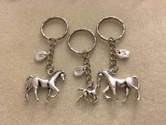 3D Silver horse keychain personalized horse keychain horse jewelry horse lover gifts couple keychain horse accessories gifts for her and him ----- ★ Choose a letter charm to make this Horse keychain or Baby horse keychain personalized. ----- ★ The Horse pendant is approximately 1 1/8 inches (27 mm). ★ The Baby horse pendant is approximately 3/4 inches (18mm). ----- ★ The key ring is 1 inch (26mm). ----- ★ I made it in a smoke-free and pet-free environment. ----- ★ With this order you will receiv Personalized Silver Keychain Gift, Horse Lover Gifts, Horse Keychain, Gifts Couple, Baby Horse, Horse Pendant, Couples Keychains, Her And Him, Horse Accessories