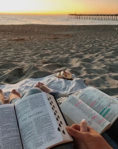 Christian couple reading their bibles together on vacation on the beach during the sunset The Ocean, The Beach, Bible, Reading