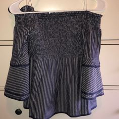 From American Eagle. Size Us Small. Blue/Gray Pinstripe. Upper Half Of Top Is Ruffled Texture. Sleeves Also Include A Ruffle. Blue Vertical Stripe Blouse For Spring, Spring Blue Blouse With Vertical Stripes, Summer Cotton Blouse With Striped Sleeves, Casual Summer Blouse With Striped Sleeves, Striped Sleeve Tops For Summer Day Out, Summer Tops With Striped Sleeves For Day Out, Casual Blouse With Striped Sleeves For Spring, Blue Vertical Stripes Top For Spring, Green Satin Top