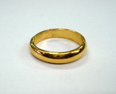 22kt gold ring from rajasthan india. Plain handmade ring made of 22kt yellow gold, good for jewelry collection. Usa ring size - 8 (we can adjust the size) Width of top - 4 mm weight - 6.5 grams Material - 22kt gold. Yellow Gold Temple Jewelry Rings For Formal Events, Formal Yellow Gold Temple Jewelry Rings, Hallmarked Round Band Gold Couple Rings, 22k Gold Round Rings For Marriage, 22k Yellow Gold Ceremonial Rings, 22k Yellow Gold Temple Jewelry Rings, 22k Gold Certified Wedding Rings, Yellow Gold 22k Temple Jewelry Rings, Temple Jewelry 22k Yellow Gold Rings