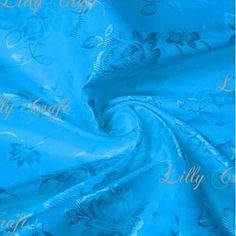 a blue fabric with flowers on it