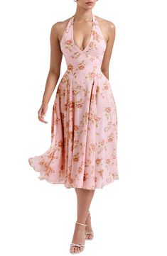 Get ready for garden-party season in a dreamy georgette sundress blooming with a stunning floral print and cut with a back-exposing halter neck. Exclusive retailer Hidden back-zip closure Halter neck Sleeveless, with cutaway shoulders Lined 100% polyester Dry clean Imported