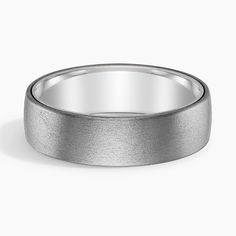 Men's 18K White Gold Tantalum and Lennon 6.5mm Wedding Ring. A distinguished satin finish on the Tantalum exterior of this mixed metal ring creates a unique, handsome look while a high-polished gold interior provides sleek comfort. 
 
 Tantalum is a dense, hypoallergenic metal that doesnt corrode with everyday use, making it the perfect choice for a wedding ring. 
 
 To properly care for a tantalum ring, read our Jewelry Care Guide. Modern White Gold Wedding Ring With Thick Band, Modern Smooth Bezel Bands For Formal Occasions, Modern Engraved Ring With Thick Band For Wedding, Formal White Gold Wide Band For Wedding, Modern Engraved Thick Band Ring For Wedding, Modern Engraved Thick Band Wedding Ring, Modern Engraved Wedding Ring With Thick Band, Wedding Rings With Thick Band And Smooth Finish, Elegant Silver Titanium Ring