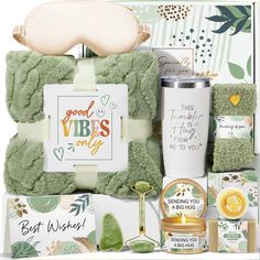 the good vibes gift hamper is filled with green towels, candles and other items