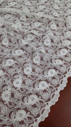 Ivory lace fabric, Wedding lace, Gorgeous Ivory Alencon Lace Fabric Both sides scalloped. Symmetrical embroidery floral pattern, with lovely flowers in the middle. You can also cut and use separately. Perfect for wedding dress, wedding veil, you can split the piece up and have one scalloped edge around the veil and will place the separate flowers throughout the piece. Very stunning and elegant! Article: EVS017B Colors: Ivory Width: 135 cm, listed for 1 meter (100 cm x 135 cm) Sold per meters (10 White Scalloped Lace Embroidered Fabric, Lace Embroidered Fabric With Lace Trim For Wedding, Wedding Embroidered Lace Fabric With Lace Trim, White Lace Dress With Lace Patchwork, White Scalloped Lace Dress, White Lace Embroidered Fabric, White Embroidered Lace Fabric, Cream Lace Dress With Scalloped Details, White Lace Dress With Scalloped Details