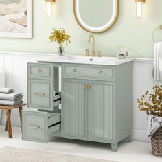 a bathroom vanity with two drawers and a mirror