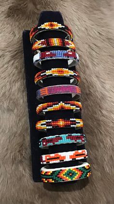 Beautiful handmade Navajo Hand Beaded Cuffs Bracelets.  Baby 4.5" including opening but they are adjustable  Handcrafted by Navajo Artist R. Sellers❤️ Present in virtually every Native American tribe, the feather symbol is universally recognized as a representation of trust, strength, wisdom, freedom, and honor. Incorporated into many sacred pieces of Native American wear, the feather is easily one of the most respected symbols. Feather Symbol, Feather Symbolism, Cuffs Bracelets, Beaded Cuff Bracelet, Child Baby, Native American Tribes, Southwestern Jewelry, Beaded Cuff, Beaded Keychains