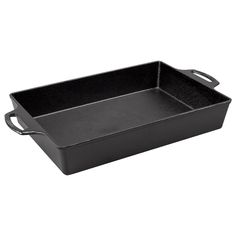 an empty black roasting pan on a white background