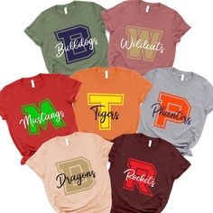 Show your team spirit with our Custom Favorite Team Shirt! Perfect for game days, football season, and any sports event, this personalized T-shirt lets you proudly display your favorite team's logo. Whether you're cheering from the stands or watching from home, this tee is a must-have for every sports lover. Ideal as a game day gift or for college football fans, it's also a great choice for football families and girlfriends who want to support their favorite players. Make every game day special Cheap Sports Season Tops With Team Logo, Cheap Fan Apparel T-shirt With Team Logo, Cheap Tri-blend Team Logo T-shirt, Game Day T Shirt, Sports Lover Gifts, Logo Tshirt, Sports Team Logos, School Team, Team Shirt