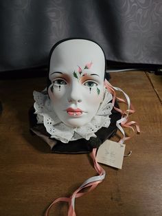 This unique sculpture, titled "Harlequin Head Handpainted Realistic Decor," is a stunning addition to any collection. Inspired by the theme of people and created in the 1980s, this multicolor plaster piece depicts a woman's face in incredible detail. The brand, Nobody's Fool, is known for their high-quality sculptures, and this piece is no exception. Perfect for any occasion and fitting in with any style, this sculpture would make a great addition to any decorative collectibles collection. Made in the United States during the 1980s, this piece is a true vintage gem. Add it to your collection today! Unique Sculptures, Masks Masquerade, The 1980s, Woman Face, True Vintage, The Fool, Im Not Perfect, The Incredibles, Hand Painted