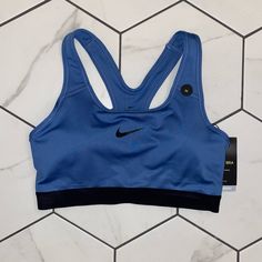 Nike Classic Sports Bra New With Tags Size Medium Dri-Fit Technology Medium Support Blue With Black Band And Check Removable Padding **Deodorant Marks From Trying On That Should Come Out In The Wash. Nike Sports Bra With Built-in Padding, Nike Sports Bra With Go-dry For Training, Nike Go-dry Sports Bra For Training, Nike Go-dry Sports Bra For Gym, Nike Activewear With Built-in Padding For Sports, Nike Sweat-resistant Sports Bra For Workout, Nike Activewear With Athletic Fit For Sports, Nike Racerback Sports Bra For Running, Nike Compression Activewear For Sports