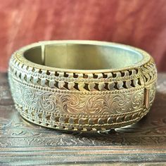 Vintage 1950s TRIFARI Silver & Gold Metal Bangle Bracelet  There is a dent in the bracelet. See photo. Latches fine. Vintage 1950s TRIFARI Silver & Gold Metal Bangle Bracelet Vintage 1950s, Bangle Bracelet, Owls, Gold Metal, Bangle Bracelets, Silver Gold, Jewelry Bracelets, Bangles, Bracelet