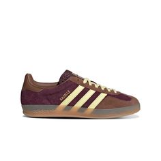 An update of the iconic indoor soccer training shoe, these adidas Gazelle shoes feature a breathable cotton mesh upper with suede overlays. The classic T-toe, 3-Stripes and gum rubber outsole stay true to the archives. Once designed for athletes, the Gazelle is now ready to take you from coffee to drinks and everywhere in between. Adidas Gazelle Shoes, Gazelle Shoes, Adidas Originals Gazelle, Indoor Soccer, Soccer Training, Stay True, Adidas Gazelle, Training Shoes, Yellow And Brown