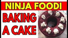 a red cake sitting on top of a white plate next to a sign that reads ninja foodi baking a cake