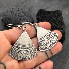 Simple yet beautiful silver triangular earrings, with small hand stamped details. Perfect earrings for any occasion, easy to match to any outfit. This are flat and light weight what makes them easy to wear. A pair to wear and never take off. They are 3.4cm- 1.45inch long 3.3cm- 1.30inch wide. They have a drop length of 5cm- 2 inch A unique addition to your jewelry collection. To see more unique silver earrings, click the link below https://www.etsy.com/shop/AkashiJewelry?ref=seller-platform-mcna Nickel-free Triangle Earrings As Gift, Nickel Free Triangle Metal Earrings, Nickel-free Metal Triangle Earrings, Nickel-free Triangle Bohemian Jewelry, Bohemian Stamped Earrings, Nickel-free Bohemian Triangle Jewelry, Bohemian Triangle Nickel-free Jewelry, Handmade Triangle Earrings For Festival, Sterling Silver Triangle Earrings For Pierced Ears