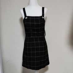 Whether You Style It Over A T-Shirt Or Wear It Solo, Bebop's Plaid Jumper Dress Fits In Perfectly With Your '90s-And-Now Aesthetic. - Plaid Casual Overall Mini Dress - Square Neckline - Exposed Back Zipper - Adjustable Straps; Grommet Hardware - Unlined - No Pockets - Color: Black & White - Size: X-Small - Nwt; Never Worn; Tried On Once - I Received The Dress With A Defect With The Back Right Strap (See Pic 5&6); It Is Sewn Incorrectly; I'm Sure It Can Be Unsticthed And Re-Sewn - Smoke-Free Home Casual Black Suspender Dress With Straps, Sleeveless Suspender Dress With Built-in Bra, Chic A-line Black Suspender Dress, Spring Black A-line Suspender Dress, Plaid Overall Dress Modcloth, Plaid Jumper Dress, Black Overall Dress, Aesthetic Plaid, Bust Form