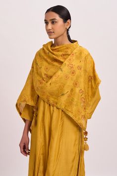 Mustard embellished kurta with three-fourth sleeves. Paired with a floral chanderi scarf and pant.
Component: 3
Pattern: Embroidered,Printed
Type Of Work: Floral Motifs
Neckline: Round
Sleeve Type: Three-fourth Sleeves
Fabric: Kurta and Pant: Cotton Silk, Scarf: Chanderi
Color: Yellow
Other Details: 
Tasselled scarf
Pleat detailing
Back keyhole
Closure:
Kurta: Side zip
Occasion: Puja - Aza Fashions Festive Raw Silk Sets With Printed Motifs, Cotton Silk Palazzo Set With Printed Motifs, Unstitched Traditional Wear With Printed Motifs For Reception, Yellow Dupatta With Printed Motifs For Transitional Season, Festive Salwar Kameez With Printed Motifs For Reception, Festive Silk Dupatta With Printed Motifs, Traditional Set With Printed Motifs For Reception, Festive Tissue Silk Sets With Printed Motifs, Designer Slub Silk Sets With Printed Motifs