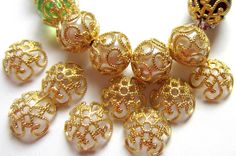 35 Filigree bead caps gold vintage style 8mm x2.5 1mm hole bright gold filigree gold bead caps jewelry making supplies Very pretty and enhancing for your art work. Gold Jewelry Spacer Beads For Crafting, Ornate Gold Beaded Jewelry, Ornate Gold Round Beaded Jewelry, Vintage Gold Jewelry With Bead Caps, Ornate Gold Round Beads Jewelry, Ornate Gold Round Bead Jewelry, Antique Gold Jewelry With Spacer Beads, Gold Jewelry With Bead Caps For Gift, Gold Jewelry With Intricate Round Beads