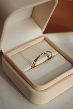 Stack up the beauty - simple, elegant rings forged from 14k solid gold. Choose between a smooth, polished look or hand hammered version. Or don't choose at all - order them both as a pair! Each purchase comes with an elegant, vegan leather box for storing + caring for your jewelry. DETAILS14k Solid GoldRing sizes 4-10 including half sizesSold as a single ring Gold Hand Forged Ring For Everyday, Hand Forged Gold Rings For Everyday, Classic 14k Gold Filled Stackable Rings Gift, 14k Gold Double Band Jewelry Gift, 14k Gold Double Band Jewelry As Gift, Classic Stackable 14k Gold Filled Rings As Gift, Dainty Hand Forged Rings For Everyday, Hammered 14k Gold Open Stackable Rings, Timeless 14k Gold Stackable Rings As Gift