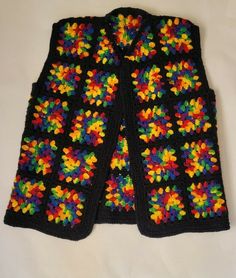 Excellent  pre-owned condition. Chest measures 19", 24" long. Please review photos for exact condition of item. Shipped with USPS Priority Mail. Crochet Hippy Vest Pattern, Multicolor Retro Knitted Outerwear, 70s Crochet Vest, Vintage Long Sleeve Granny Square Outerwear, 70s Crochet Granny Square Vest, Granny Square Vest, Cozy Multicolor Granny Square Outerwear, Vest Sweater, Crochet Stuff